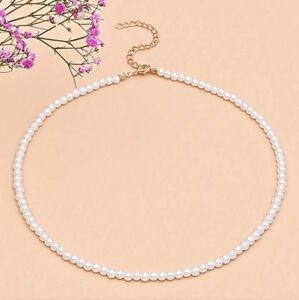 Elegant Pearl Necklace with Gold Accents